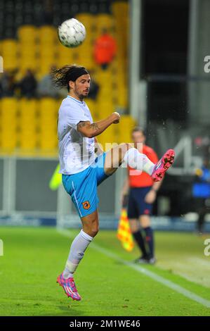 George Boyd de Hull City pendant le match entre l'équipe belge de première division Sporting Lokeren et l'équipe anglaise Hull City A.F.C., jeudi 21 août 2014 à Lokeren, la première étape des éliminatoires pour le concours de l'UEFA Europa League. Banque D'Images