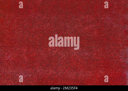 Tapis rouge fond texture motif matériau textile surface design toile de fond abstrait. Banque D'Images