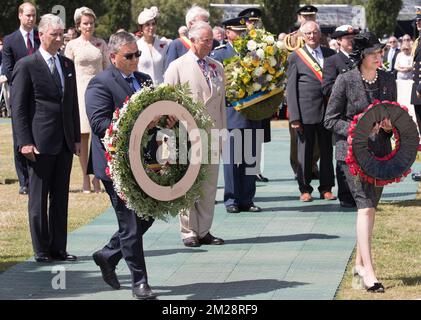 Minister of Defence and Public Service Steven Vandeput and British Prime Minister Theresa May pictured during the commemorations at the Tyne Cot Commonwealth War Graves Cemetery part of the commemoration for the centary of Passchendaele, the third battle of Ypres on 30th and 31st July 2017, Monday 31 July 2017. BELGA PHOTO POOL BENOIT DOPPAGNE Stock Photo