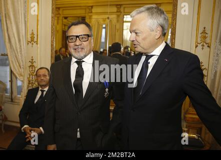 Antonio Pinto du restaurant Belga Queen et vice-Premier ministre et ministre des Affaires étrangères Didier Reynders photographié lors d'une cérémonie pour décerner le titre « Chevalier de l'ordre de Léopold II » à divers chefs actifs à Bruxelles, le vendredi 22 décembre 2017 à Bruxelles. BELGA PHOTO NICOLAS MATERLINCK Banque D'Images