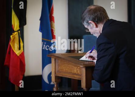 Illustration picture shows someone signing a condolence book, opened in Liege city hall, Wednesday 30 May 2018. An armed man, Benjamin Herman, shot dead two police officers and one passer-by. The shooter was on home leave from prison and has been shot dead by the police. BELGA PHOTO VIRGINIE LEFOUR Stock Photo