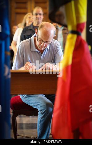 Illustration picture shows someone signing a condolence book, opened in Liege city hall, Wednesday 30 May 2018. An armed man, Benjamin Herman, shot dead two police officers and one passer-by. The shooter was on home leave from prison and has been shot dead by the police. BELGA PHOTO VIRGINIE LEFOUR Stock Photo