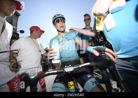 Le danois Magnus Cort d'Astana (C) célèbre après avoir remporté la scène 15th dans l'édition 105th de la course cycliste Tour de France, de Millau à Carcassonne (181,5km), France, dimanche 22 juillet 2018. Le Tour de France de cette année se déroule de 7 juillet à 29 juillet. BELGA PHOTO YORICK JANSENS Banque D'Images