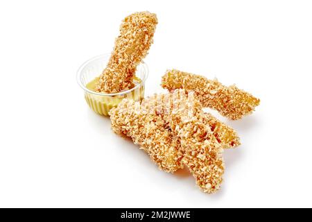 Lanières de poulet panées frites avec sauce au miel et à la moutarde Banque D'Images