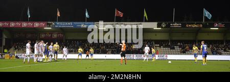 Westerlo's players, Westerlo's Lukas Van Eeno and Westerlo's Bryan Reynolds  celebrate after winning a soccer match between KV Oostende and KVC Westerlo,  Saturday 18 March 2023 in Oostende, on day 30 of