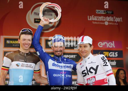 l-4, second Belgian Oliver Naesen of AG2R La Mondiale, winner French Julian Alaphilippe of Deceuninck - Quick-Step and third Polish Michal Kwiatkowski of Team Sky celebrate on the podium after the 110th edition of the 'Milano-Sanremo' one day cycling race, 294 km from Milan to Sanremo, Italy, Saturday 23 March 2019. BELGA PHOTO YUZURU SUNADA FRANCE OUT  Stock Photo