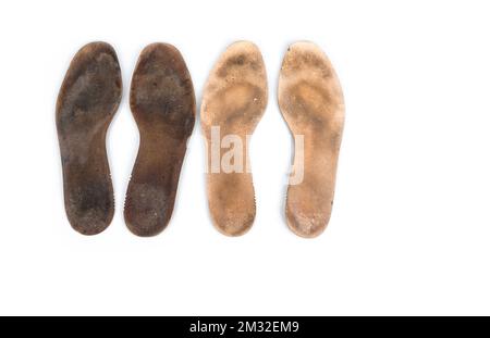 Semelles intérieures lourdes utilisées sur fond blanc Banque D'Images