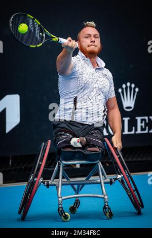 Nicolas Peifer photographié en action lors d'un match de tennis entre British Alfie Hewett et Français Nicolas Peifer, dans les quarts de finale de la compétition de fauteuil roulant pour hommes de l'Open d'Australie Grand Chelem, dimanche 14 février 2021 à Melbourne Park, Melbourne, Australie. BELGA PHOTO PATRICK HAMILTON Banque D'Images