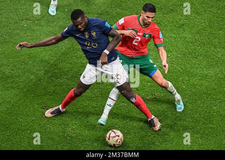 Al Chaur, Qatar. 14th décembre 2022. Football, coupe du monde, France - Maroc, finale, demi-finale, Stade Al-Bait, Marcus Thuram en France et Achraf Hakimi au Maroc en duel. Crédit : Robert Michael/dpa/Alay Live News Banque D'Images