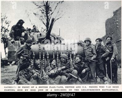 Troupes britanniques et américaines ayant un « chant » devant un char Sherman « Flail », près de Geilenkirchen, fin 1944. Geilenkirchen a été un point clé de la 'ligne allemande de Siegfried' et a été capturé par une force combinée de soldats britanniques et américains en novembre 1944. Banque D'Images