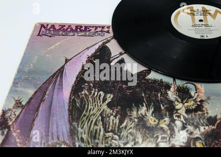 Hair of the Dog est le sixième album studio du groupe Scottish Hard Rock Nazareth sur fond d'album vinyle LP. Banque D'Images