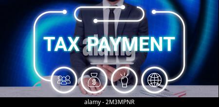 Affiche le paiement des taxes. Photo conceptuelle une somme d'argent que vous devez payer au gouvernement Banque D'Images