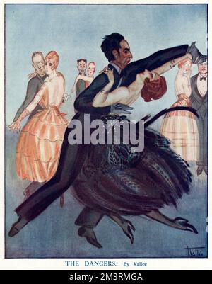 Un couple exotique danse de façon spectaculaire tandis que d'autres regardent. 1920 Banque D'Images