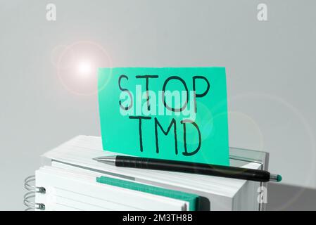 Panneau d'écriture à la main Stop TMD. Approche commerciale prévenir le désordre ou le problème affectant les muscles de mastication Banque D'Images