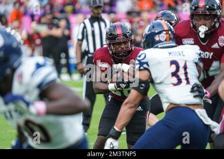 Orlando, Floride, États-Unis, 16 décembre 2022, Troy Trojans en arrière Kimani Vidal #28 tenter de briser la défense pendant la première moitié au stade Explora. (Crédit photo : Marty Jean-Louis) Banque D'Images