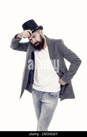 Sans compromis sur le style. Homme de mode dans un style rétro. Taille basse tendance avec moustache et barbe dans un style décontracté avec chapeau vintage. Homme barbu dedans Banque D'Images