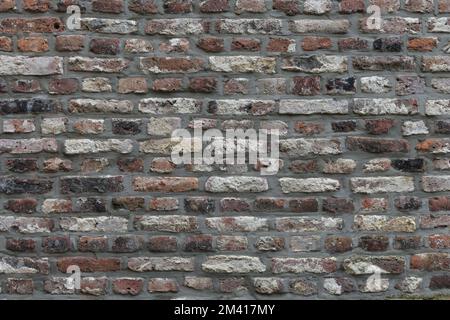 Arrière-plan créatif d'un mur de briques. Ton gris blanc Banque D'Images