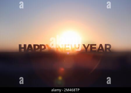 Lever du soleil et forêt d'arbres enneigés du nouvel an 2023 bonne année et jour de l'an bonne ANNÉE Banque D'Images