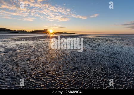 Mer des Wadden à Cuxhaven, Allemagne au coucher du soleil Banque D'Images