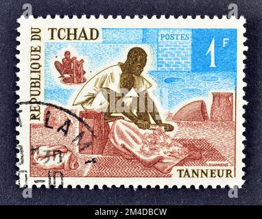 Timbre-poste annulé imprimé par le Tchad, qui montre Tanner, vers 1970. Banque D'Images