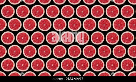 motif tendance et coloré issu d'une photo d'un demi-pamplemousse sur fond noir. Photo de haute qualité Banque D'Images