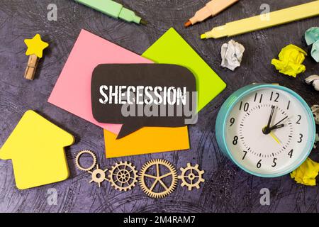 text on gray word secession in small wooden letters with black font on a blue background Stock Photo
