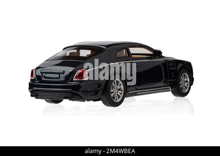 December 18, 2022, Moscow, Russia: Rear view of a luxury car model on a white background. Copy space. Stock Photo