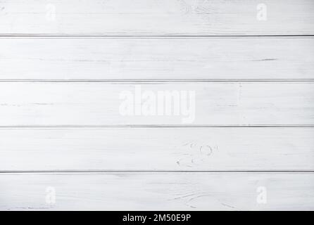 Fond en bois blanc.mur en bois massif de panneaux abîmés. Vue de dessus et image d'espace de copie Banque D'Images