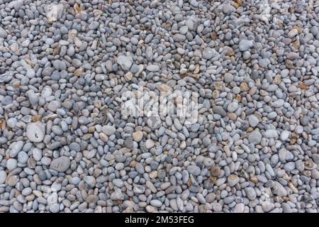 texture de pierres grises d'une plage Banque D'Images