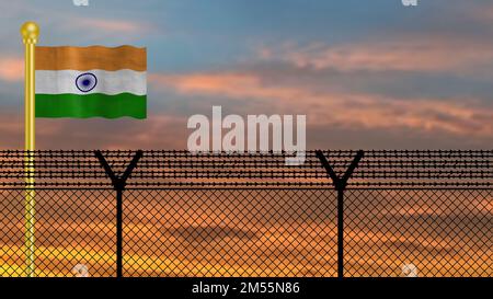 Drapeau indien agitant sur la frontière de défense à l'heure du coucher du soleil image d'illustration. Banque D'Images