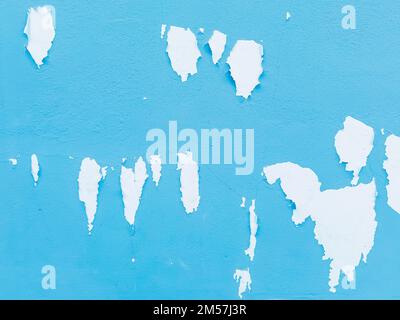 Gros plan sur la texture de la peinture écaillée de couleur sur la surface du mur de ciment. L'ancien mur de ciment, la peinture et le mastic, se décolle et s'effondre. Grunge fond tex Banque D'Images