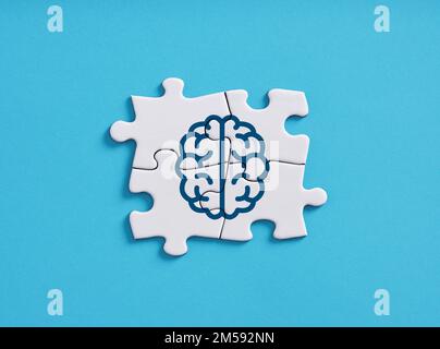 Connectivité des hémisphères gauche et droit du cerveau. La cognition, la pensée, la résolution de problèmes et la santé mentale. Symbole du cerveau humain sur la scie sauteuse connectée pu Banque D'Images