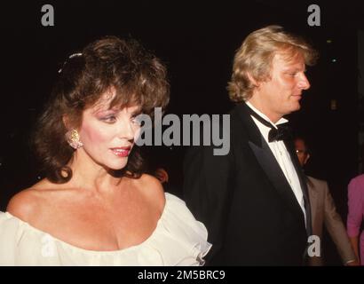 Joan Collins et Peter Holm Circa années 1980 crédit: Ralph Dominguez/MediaPunch Banque D'Images