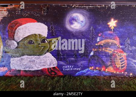 La fresque Star Wars avec Yoda à Santa Hat et BB8 lumières de Noël a été créée sur un mur à Leeds par les artistes Laffiti & Northern Mural Co Banque D'Images