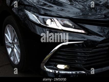 Arrière-plan des roues et des feux de voiture sport, éléments de voiture fermer le fond d'écran Banque D'Images