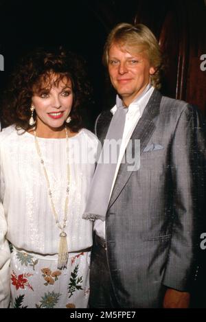 Joan Collins et Peter Holm Circa années 1980 crédit: Ralph Dominguez/MediaPunch Banque D'Images