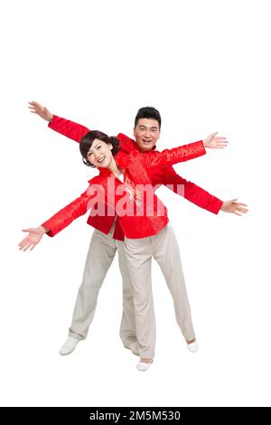 Couples chinois heureux tenue nouvel an Banque D'Images