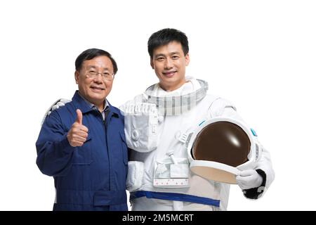 Séance photo avec l'équipe d'astronautes et d'ingénieurs Banque D'Images