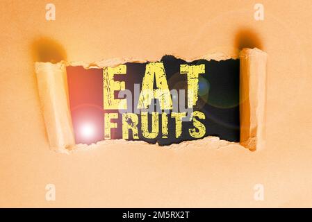 Écriture affichant du texte mangez des fruits. Internet concept consommer tout produit de la croissance végétale utile aux humains ou aux animaux Banque D'Images