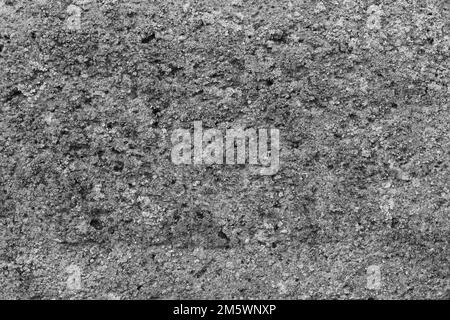 Texture brique pierre. Surface dure. Arrière-plan abstrait. Gros plan noir et blanc Banque D'Images