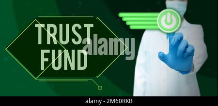 Fonds fiduciaire d'affichage conceptuel. Mot pour argent qui est détenu par les fiduciaires pour les bénéficiaires Banque D'Images
