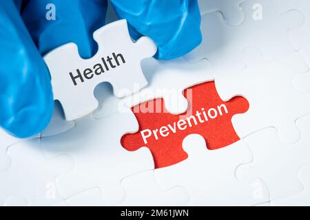 Santé et prévention, Inscription sur un puzzle, concept, prévention de la santé, promotion d'un mode de vie sain, examens périodiques Banque D'Images