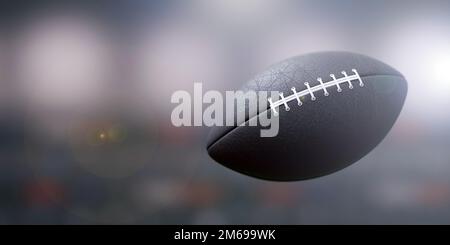 Ballon de football américain sur fond noir, Banque D'Images