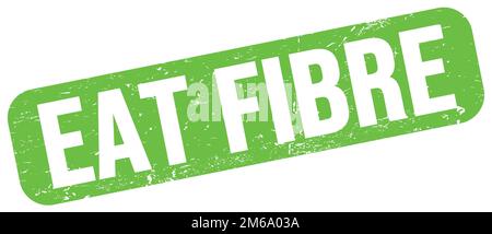 LE texte EN FIBRE DE MANGEZ est inscrit sur l'affiche verte en forme de timbre grungy. Banque D'Images