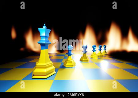 Le roi des échecs et les pions peints en Ukraine drapeau bleu et jaune sur une planche d'échecs sur fond de flammes de feu. Concept de leadership et d'intelligence. Banque D'Images