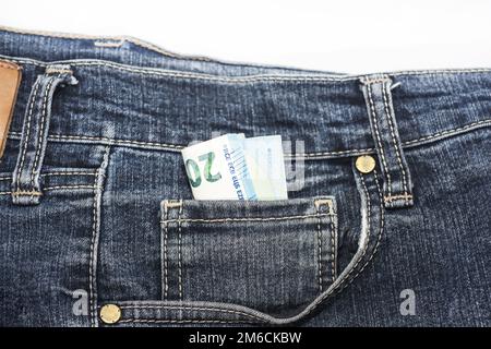 Billets en euros en jeans. Banque D'Images