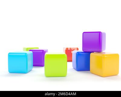 Cubes de plastique en couleur sur un fond blanc. Banque D'Images