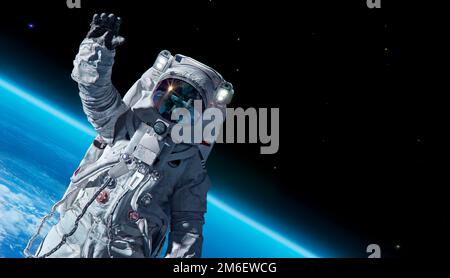 12 avril 1969, Journée internationale du vol spatial humain, concept de la Journée Cosmonautics avec l'astronaute de l'ISS dans l'espace sur fond d'avion terrestre Banque D'Images