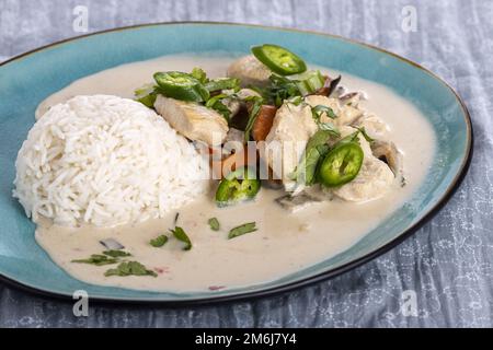 Poulet au curry avec du riz thaï Banque D'Images