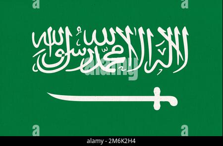 Drapeau de l'Arabie Saoudite. Drapeau saoudien sur la surface du tissu. Texture du tissu Banque D'Images